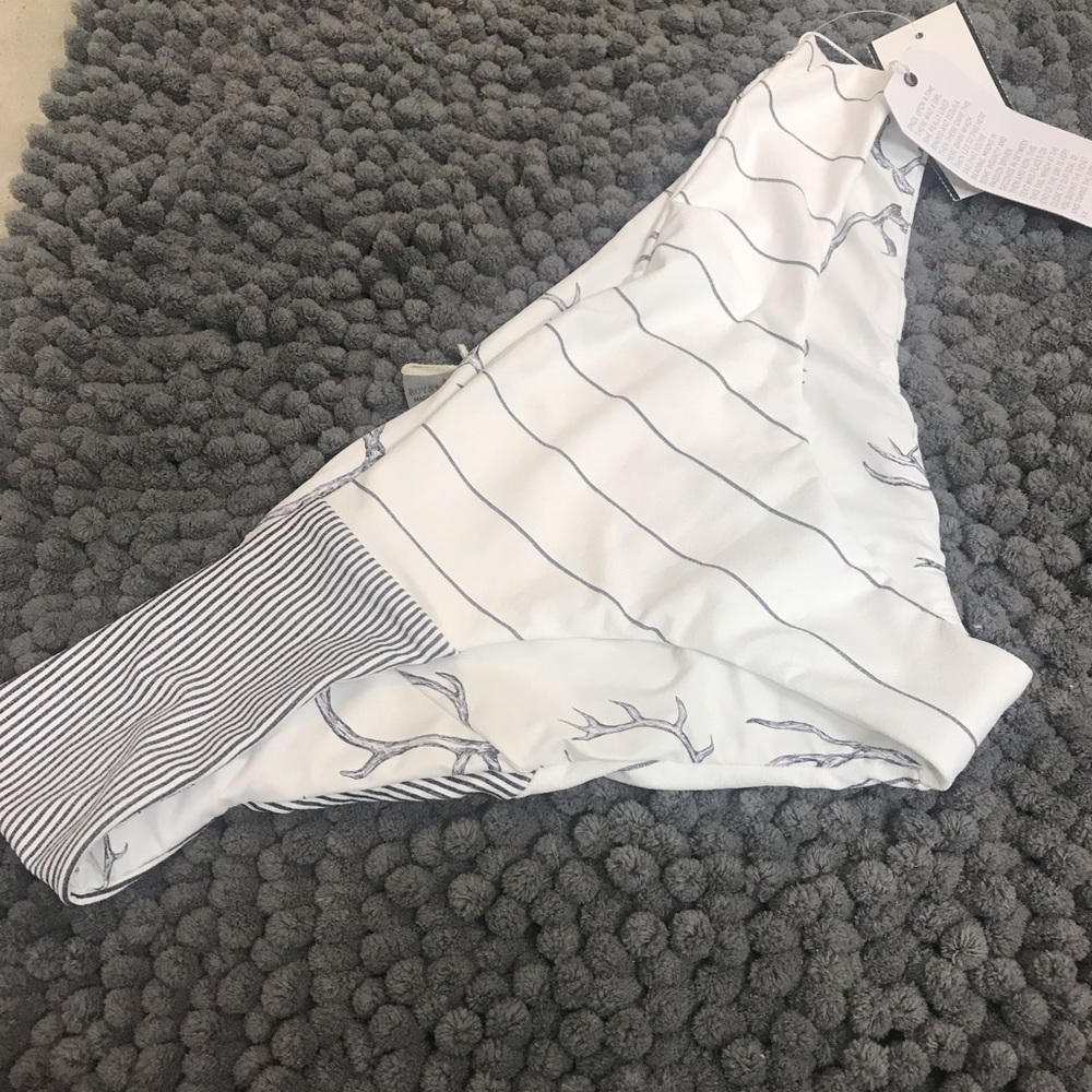 Boys & Arrows behind bars